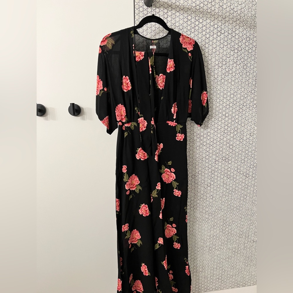 Black Reformation jumpsuit in floral print (US 6)